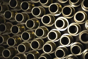 Close-up view of brass pipe fittings used by Iron Mechanical for precision plumbing and HVAC systems.